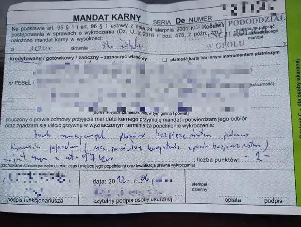 mandat za brak pas&oacute;w bezpieczeństwa